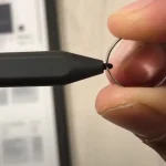 put the replacement tool into the tip of the pen